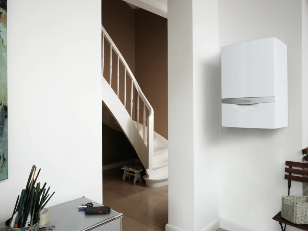 Vaillant combi boiler installed in a hallway cupboard